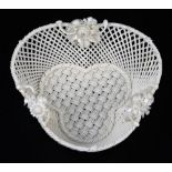 A Belleek three strand Shamrock basket, 17cm across. For a similar example see Belleek Irish Porcela