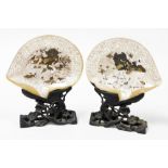 A pair of Chinese pierced and carved mother of pearl shells, decorated in lacquer with birds and flo