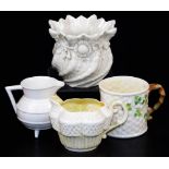 A second period Belleek Shamrock christening mug, decorated in polychrome shamrock, a Erne creamer,