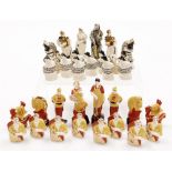 A late Russian chess set, after the original by Natalia Danko, each figure with a black signature to