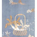 A late 19thC Japanese silk embroidery of daikon (radishes) in a basket with surrounding plants, 53cm