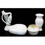 A group of third green mark period Belleek wares, including a heart shaped dish, a Cleary sugar basi