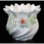 A Belleek flower pot, with applied coloured flowers, black Belleek mark third type 1891-1926, 10cm h