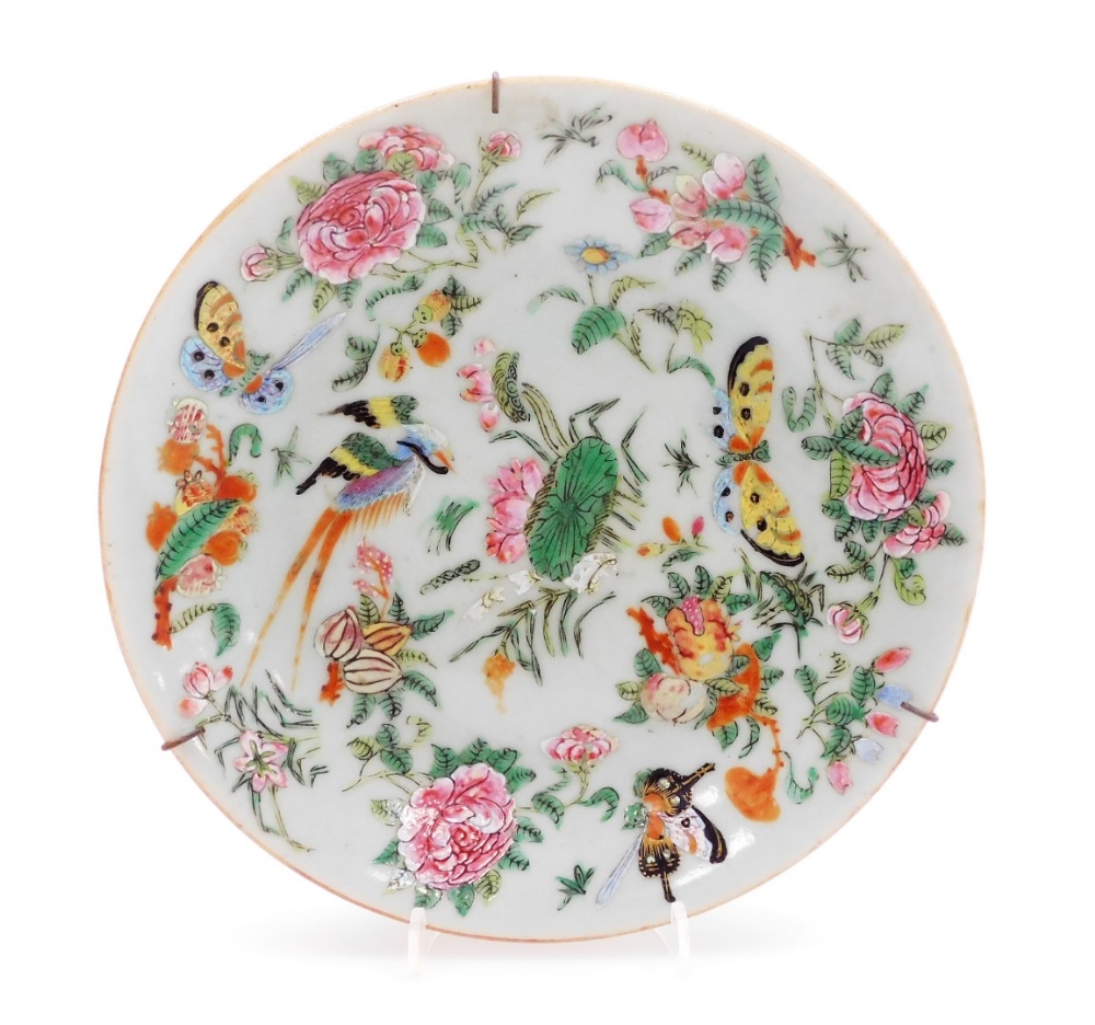 A late 19thC Cantonese famille rose porcelain plate, painted with birds, flowers and leaves, on a ce