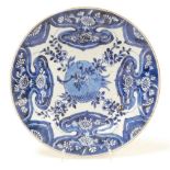 An 18thC Chinese blue and white porcelain plate, with central pomegranate design, 22cm diameter. (AF