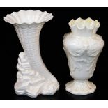 A tall Belleek Rathmore vase, of moulded form; together with a mid rock spell vase, the trumpet corn