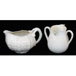 A unmarked black first period Belleek Tridacua creamer, and a second period black marked two handled