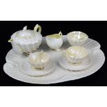 A rare Belleek complete cabaret set with tray, teapot and cover, creamer, sugar and two teacups and