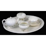 A first period Belleek Echinus solitaire set, comprising tray, teapot and cover, creamer, sugar, cup