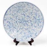 A Chinese blue and white porcelain charger, with scrolling leaf decoration, probably 19thC, 37cm dia