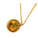 A South African 1/10th Krugerand 1984, 9ct gold pendant mounted on chain, 5.8g.