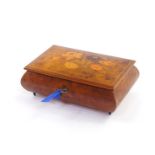 A Sorrento 20thC burr walnut musical jewellery box, with floral marquetry inlaid to the lid, 20cm wi