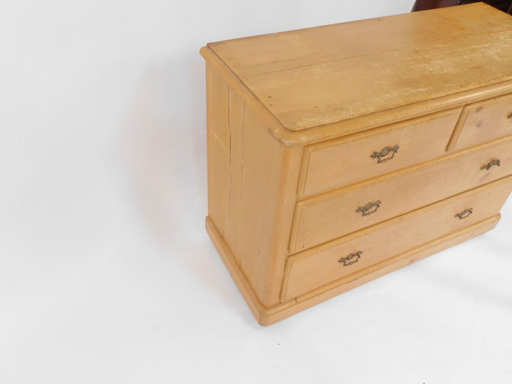 A Victorian pine chest, of two short over two long drawers, raised on a plinth base on castors, 75.5 - Image 3 of 3