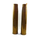 A pair of WWII brass shell cases, 72cm high.