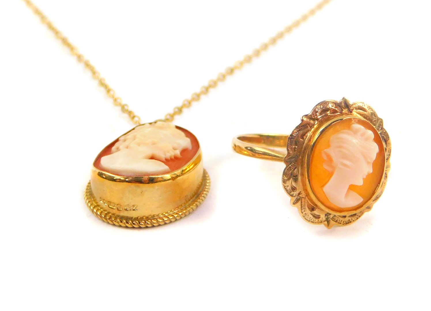 A 9ct gold and shell cameo ring, bust portrait of a lady, size P, and a 9ct gold and shell cameo pen