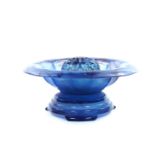 A Davidson blue cloud glass 1930's rose bowl, of fluted form on stand with a frog, 33.5cm wide.