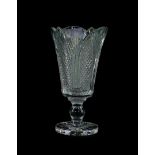 A Waterford Crystal vase, raised on a single knop stem, and star cut circular base, 25cm high.