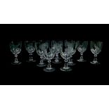 A set of twelve Caithness glass wine glasses, engraved with game birds, wild and domestic animals.