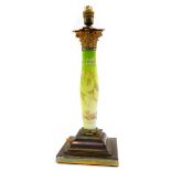 An early 20thC brass and opalescent glass electric table lamp, of Corinthian column form, the column