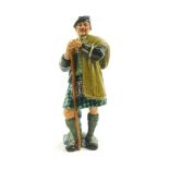 A Royal Doulton figure modeled as The Laird HN2361.