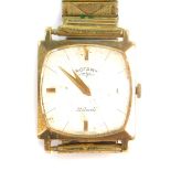 A Rotary 9ct gold cased gentleman's wristwatch, silvered dial with gold batons, 21 jeweled movement,