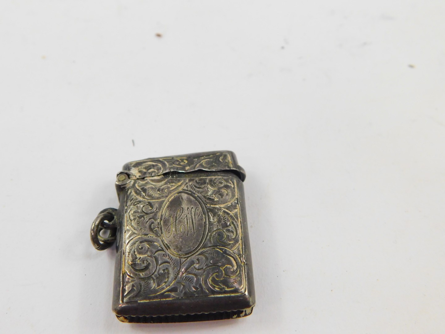 A George V silver vesta case, with engraved foliate decoration, oval shield reserve monogram engrave - Image 2 of 3