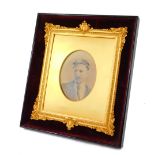 A Victorian gilt wood and gesso strut photograph frame, red velvet backed within an ebonised outer f