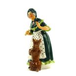 A Royal Doulton figure modeled as Old Mother Hubbard HN2314.