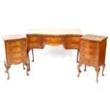 A 20thC mahogany and burr walnut serpentine part bedroom suite, comprising a dressing table, one lon