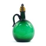 A Georgian Bristol green glass wine jug, with brass mount and capped cork stopper, 21.5cm high.