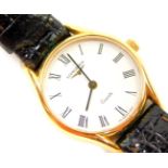 A Longines lady's gold plated cased wristwatch, circular white dial bearing Roman numerals, stainles