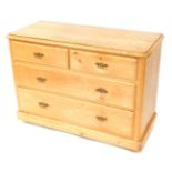 A Victorian pine chest, of two short over two long drawers, raised on a plinth base on castors, 75.5