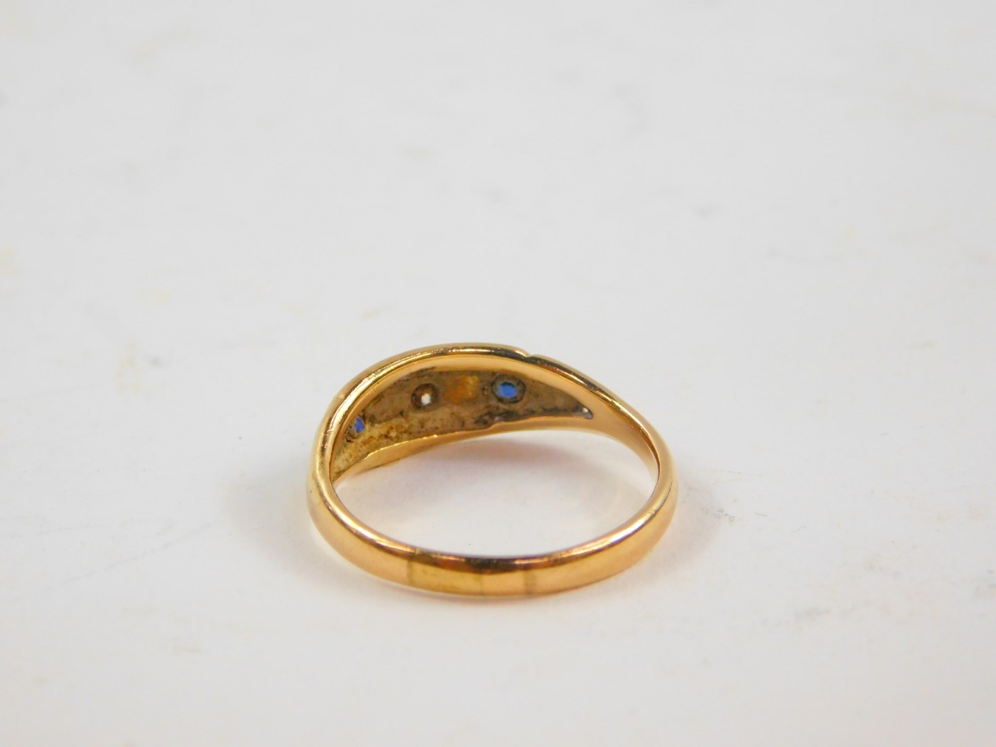 An 18ct gold sapphire and diamond three stone gypsy ring, size P/Q, 3.5g. - Image 2 of 3