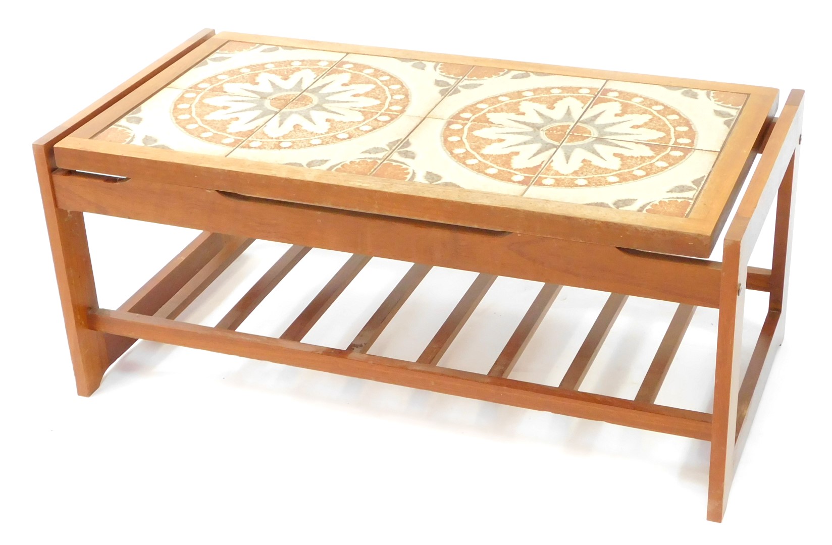 A 1960's tile top teak coffee table, possibly Danish, the top with eight tiles in a floral pattern,