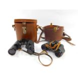 A pair of Lieberman & Gortz 12x40 military binoculars, cased, together with a pair of Carl Zeiss 8x3