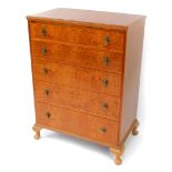 A mid century burr walnut and walnut crossbanded chest, of five long graduated drawers, raised on ca