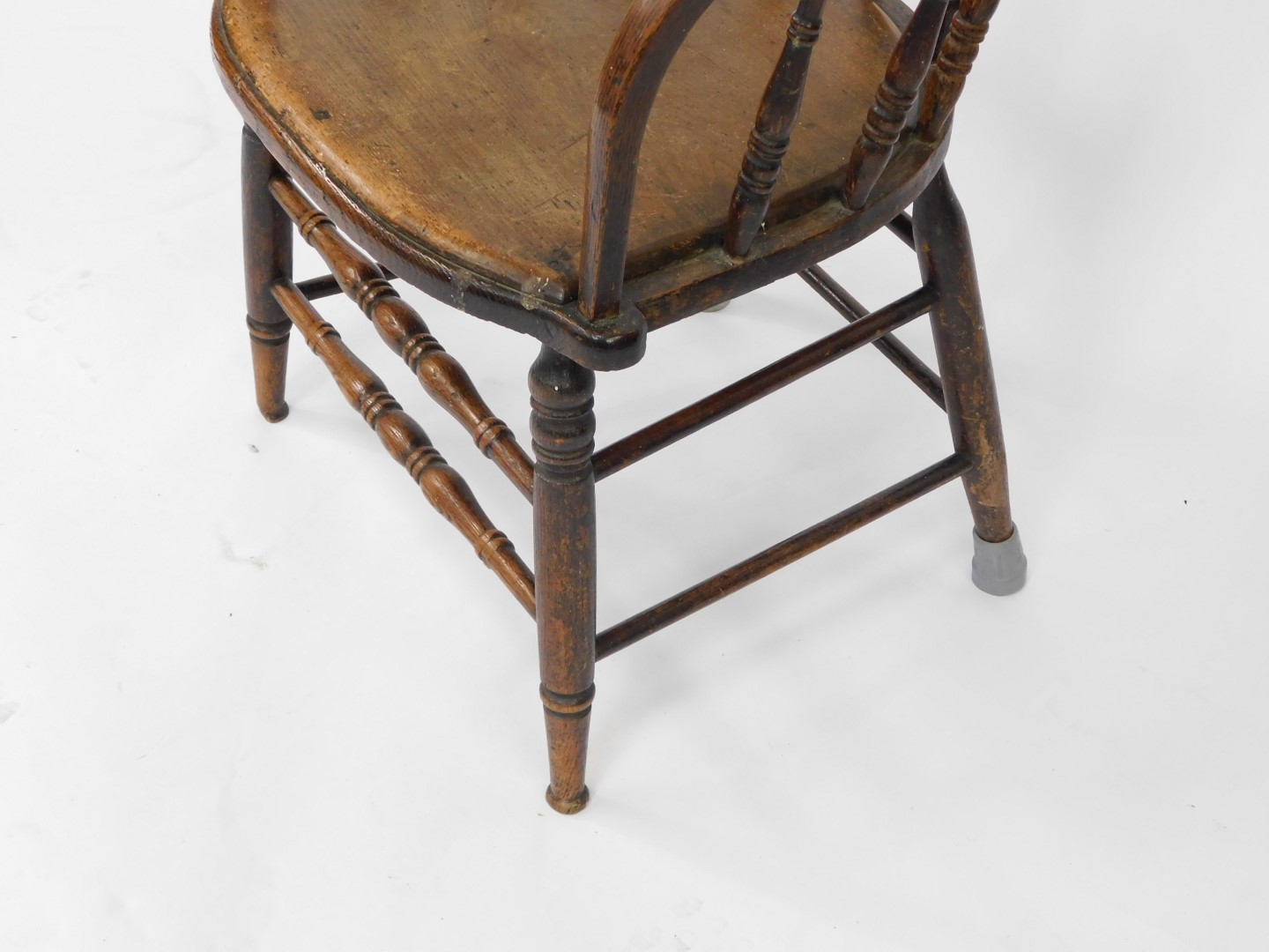 A Victorian oak captain's chair, with a screw down solid seat, raised on turned legs united by turne - Image 3 of 3