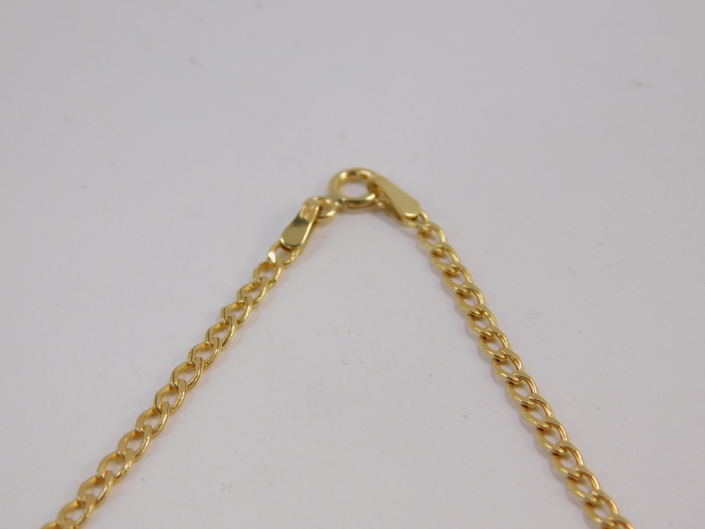 An Elizabeth II gold half sovereign 2000, 9ct gold pendant mounted on chain, 8.2g. - Image 4 of 4