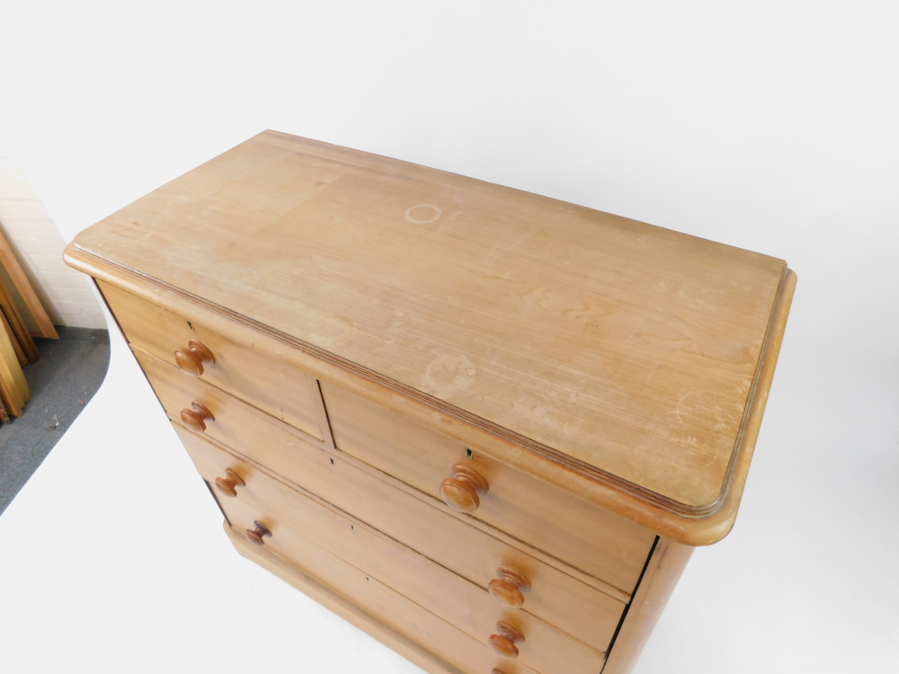 A Victorian striped mahogany chest, of two short over three long drawers, raised on a plinth base ov - Image 2 of 3