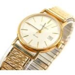 A Timex 9ct gold cased gentleman's wristwatch for C Bright, champagne dial with gold batons, centre