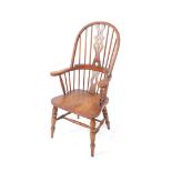 A 19thC style ash and elm high back Windsor chair, with inverted pierced back splat, plain spindles,