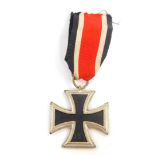 A Third Reich Iron Cross, Second Class, with ribbon, boxed.