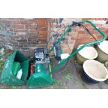 A Suffolk Punch petrol cylinder mower, 14S, 40kg, TYP FD16303842.