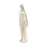 A Lladro bisque porcelain figure of a naked lady, modelled in standing pose with a draped sheet, pri