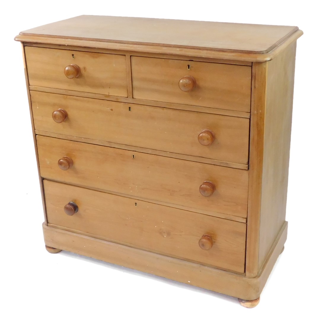 A Victorian striped mahogany chest, of two short over three long drawers, raised on a plinth base ov