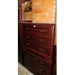 A pair of mahogany effect chests of three drawers, 75cm high, 91cm wide, 47cm deep., together with