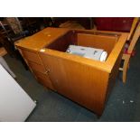 A Pfaff 92 sewing machine, enclosed within a teak cabinet, with accessories, 77cm high, 87cm wide, 4