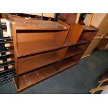 A mahogany bookcase, with central recess above two shelves, 101cm high, 56cm wide, 24cm deep.