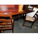 An oak veneered refectory dining table, 75cm high, 152cm wide, 77cm deep, together with six chairs