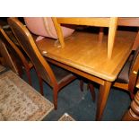 A 1970's extending dining table, 73cm high, 158cm wide, 198cm extending, 81cm deep, and six matching